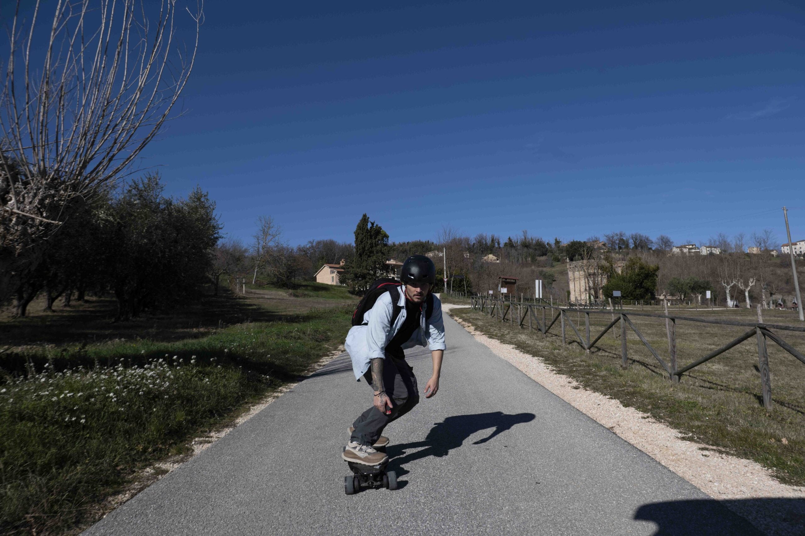The Eco-Friendly Commute: Electric Skateboards vs. Tesla Model 3