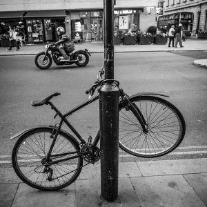 bike locked to telephone pole 