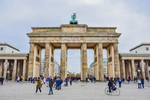 Brandenburg Gate with people and bicyclists